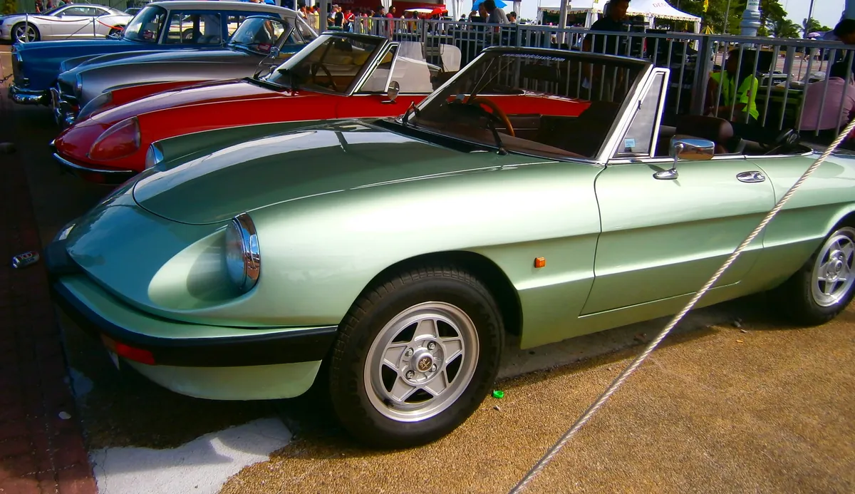 A classic Italian roadster with the top down